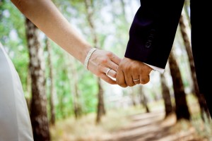 Lisa Ryan's photo of a wedding couple holding hands